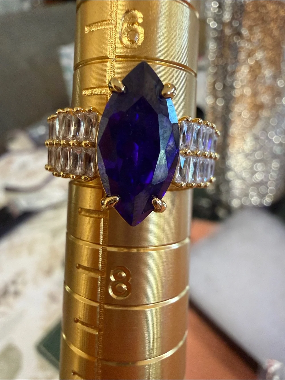 Gold-Tone Ring with Marquise Purple Stone and Clear Accents